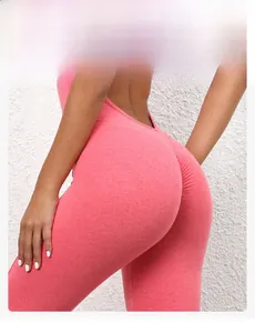 Detail of rose pink scrunch butt yoga bodysuit with seamless front and lifting texture