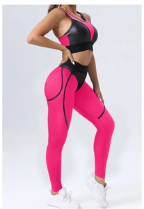 Detail of neon pink and black mesh sports bra and high-waisted leggings yoga set