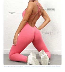 Detail of rose pink yoga jumpsuit featuring thin cross straps and scrunch butt texture