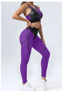 Detail of purple and black mesh yoga set with textured fabric and high-waist lifting pants
