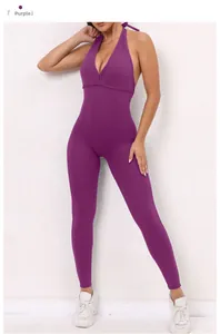 Close-up of purple high-waisted yoga bodysuit with halter neck and deep V-neckline
