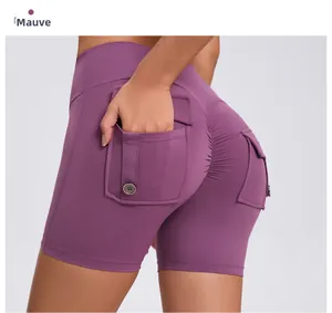 Detail of high waist yoga shorts in deep purple with side pocket and scrunch butt design