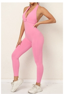 Side view of pink backless yoga jumpsuit with flattering ruched peach lifting design