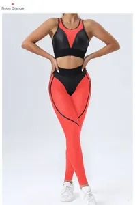 Detail of fluorescent orange and black yoga set with mesh stitching and push-up fit