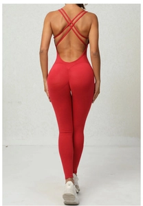 Detail of red scrunch butt yoga bodysuit with cross-back straps and open back design