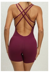 Detailed back view of a burgundy backless sports bodysuit with thin criss-cross straps
