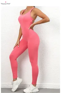 Detail view of the papaya pink scrunch butt yoga jumpsuit with racerback design