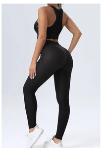 Detail view of black yoga set featuring mesh texture fabric and butt-lifting leggings