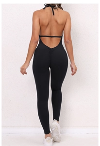 Macro view of the ruched back seam and scrunch butt detail on the black yoga jumpsuit