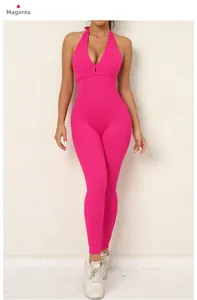 Detailed close-up of rose red criss-cross back and ruched peach lifting yoga jumpsuit