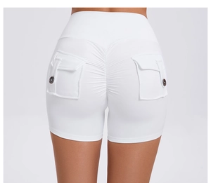 Detail of high waist white scrunch yoga shorts with cargo pockets and button decor