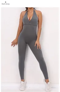 Close-up of dark grey high-stretch yoga jumpsuit featuring a halter neck and V-neckline