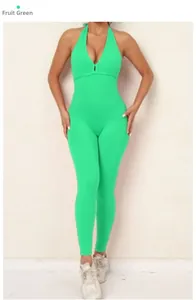 Detail of lime green backless yoga bodysuit featuring scrunch butt and deep V neckline