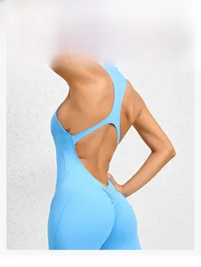 Close-up of sky blue yoga bodysuit showing back cutout and ruched butt-lifting detail