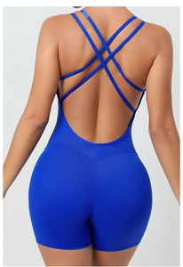 Detail of royal blue one-piece yoga jumpsuit featuring a criss-cross back design