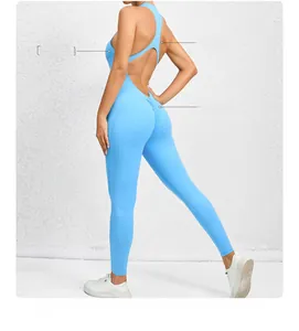 Detail of light blue yoga jumpsuit featuring an open back design and ruched butt lifting seam