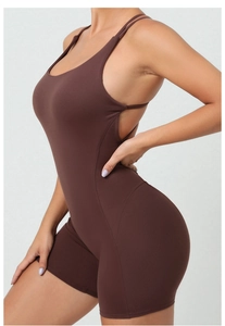 Detail view of coffee brown yoga jumpsuit with thin straps and open back design