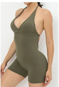 Close-up of olive green halter neck bodycon romper with backless yoga jumpsuit detail