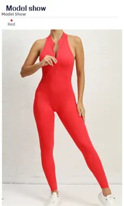 Detailed view of the red one-piece yoga jumpsuit with front zipper and stand-up collar