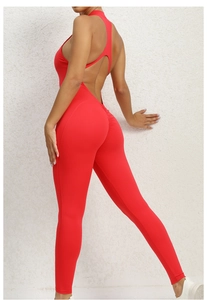 Detail of red backless yoga jumpsuit with criss-cross straps and scrunch butt lifting effect