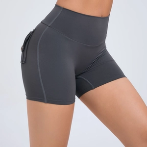 Dark grey high waist yoga shorts with peach lifting effect and side button pockets
