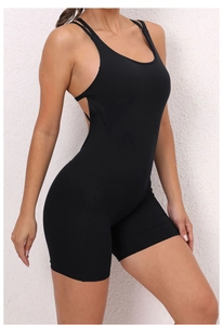 Detail of black sports jumpsuit featuring double spaghetti straps and cross hollow back design