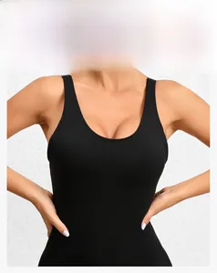 Close-up of U-neck shoulder strap design on black seamless yoga bodysuit top