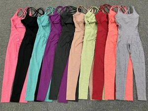 Flat lay of multi-color ribbed jumpsuits featuring scrunch butt and open back details