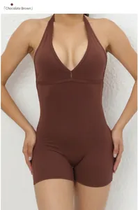 Close-up of chocolate brown halter neck yoga bodysuit with deep V-neck and elastic fabric