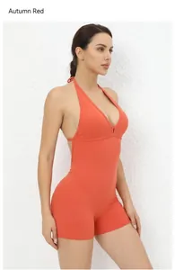 Detail view of the autumn red backless yoga jumpsuit with premium elastic fabric texture