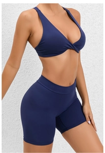 Close-up of Navy Blue Yoga Set featuring V-neck knot bra and high-waisted gym shorts