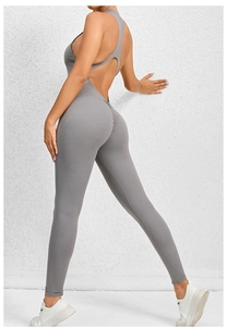 Detailed back view of grey yoga bodysuit featuring cutout design and scrunch butt detail