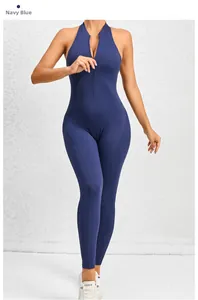 Detail of navy blue one-piece yoga jumpsuit featuring a front zipper and slim fit design