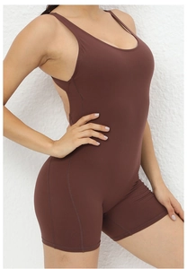 Detailed side view of high-elasticity dark brown yoga bodysuit with an open back design