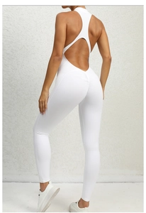 Close-up of open back design and scrunch butt detail on a white yoga jumpsuit