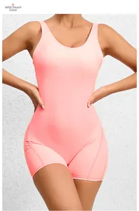 Front detail of wild peach one-piece yoga jumpsuit with u-neck and slimming fit