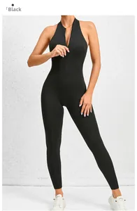 Detailed view of black sports unitard featuring a front zipper and halter neck design