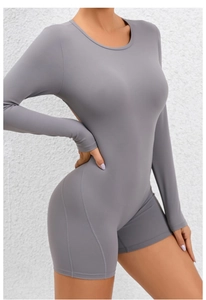 Side view of grey tight-fitting backless long-sleeve yoga bodysuit in premium elastic fabric