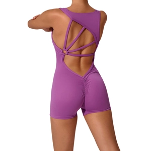Purple backless yoga romper with crisscross straps and ruched butt lifting design