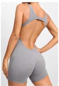 Detail view of the racerback and open-back design on this grey yoga bodysuit for women