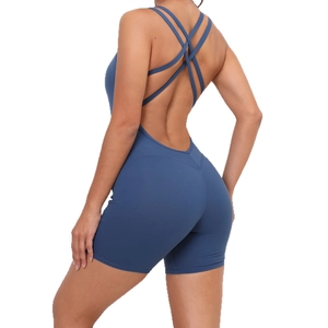 Blue backless yoga bodysuit with cross straps and peach lift effect for fitness