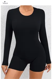 Close-up of black high-stretch backless yoga jumpsuit with smooth knitted texture