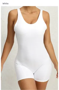 Close-up of a white one-piece yoga jumpsuit with racerback design and ribbed texture