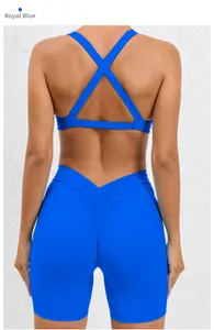 Detail of royal blue sports set showing criss-cross back bra and scrunch butt gym shorts