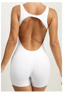 Close-up of the elegant back cutout design on this white seamless fitness bodysuit