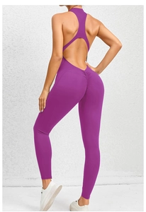 Rear view of purple one-piece yoga jumpsuit with racerback and scrunch butt detail
