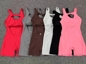 Detailed flat lay of yoga bodysuits in six colors featuring racerback and cutout details