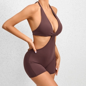 Brown cut-out one-piece yoga bodysuit with halter neck and twisted chest detail