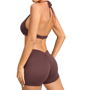 Two-piece yoga set with backless halter top and ruched butt-lifting shorts in dark brown