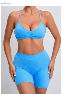 Detail of blue high-stretch yoga set with V-neck sports bra and high-waist fitness shorts